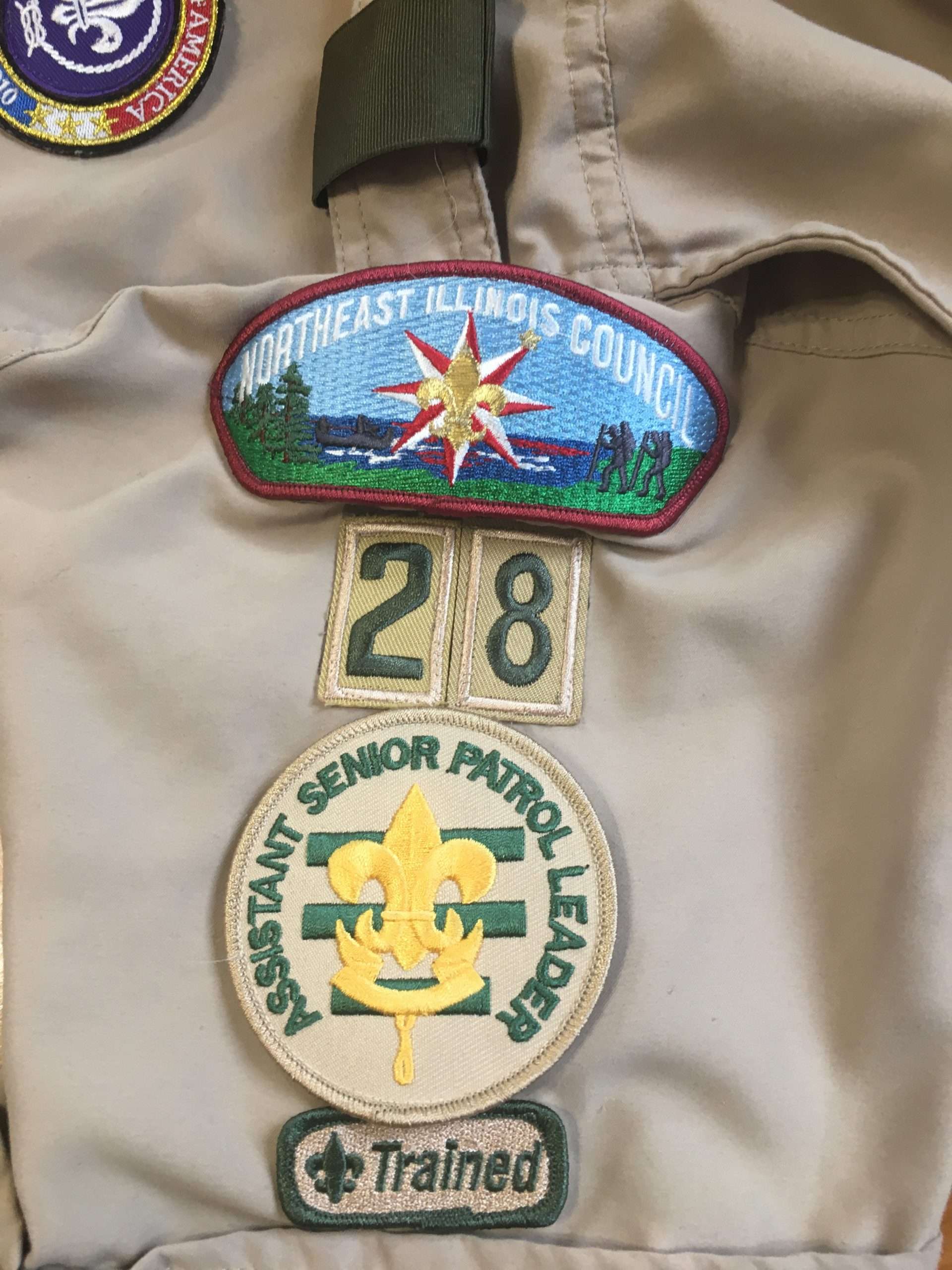 Council patch and unit numerals 28 on the left sleeve